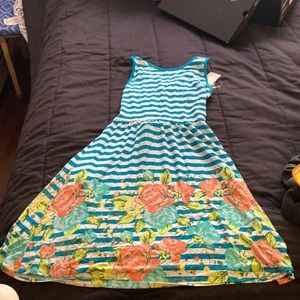 Girls medium sun dress crisscross back.